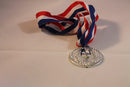Medaille per stuk
